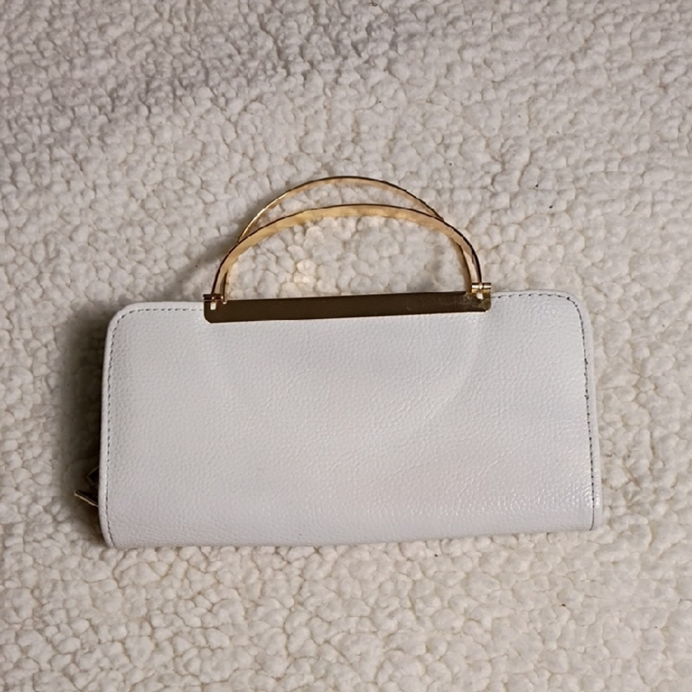 Elegant White Handbag with Gold Accents